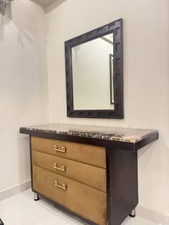 Bed and dressing table