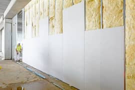 gypsum board partition,glass partition,wallpaper,wooden floor,media wa