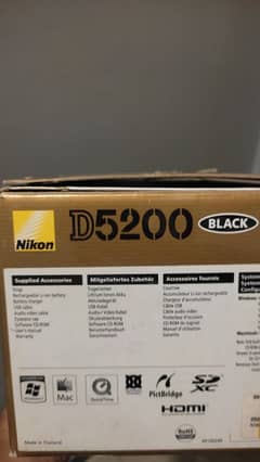 Nikon D5200 with 18-55 lens , with original box and travel bag