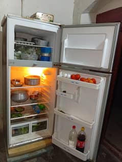 Two door good condition refrigerator is available