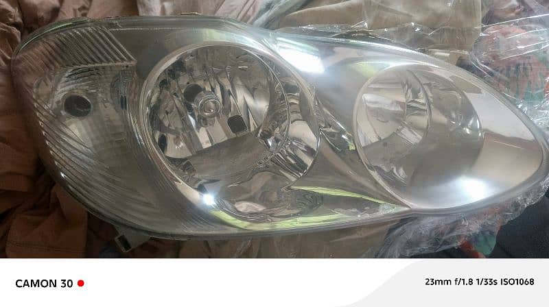 GENUINE SE SALOON CorollaHEADLIGHTS 1