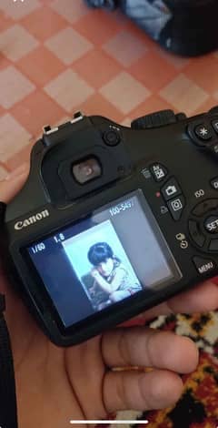 Canon 1100 D