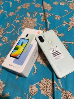 Readmi A1 plus mobile model name 10/10 conditon complete box & charger