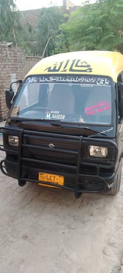Suzuki Bolan 2011 model yellow cab