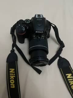 D 5600 nikon with 18-55 mm lens
