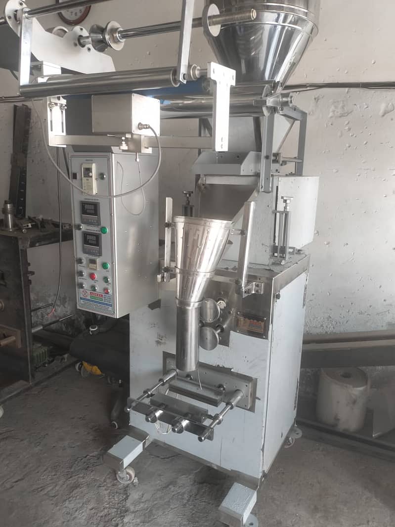 Automatic Packing Machine For Slanty/Nimko/Chips/Spices/Rice/Surf/Dal 7