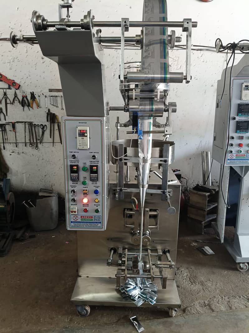 Automatic Packing Machine For Slanty/Nimko/Chips/Spices/Rice/Surf/Dal 9
