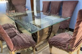 dinning table with 8 chairs looks better and luxurious style