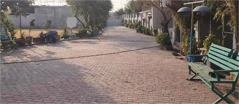 4 kanal Plot with Building on Main Express Way Interchange Big Front On Rent 1
