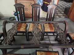 solid wooden dinning table with  12 mm glass and 8 chairs