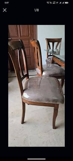 Elegant 6-Seater Wooden Dining Table with Glass Top & Carved Chairs