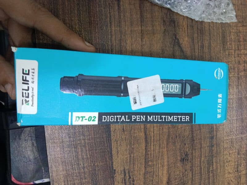 RELIFE DT-02 digital pen multimeter, tool used for testing electronics 1