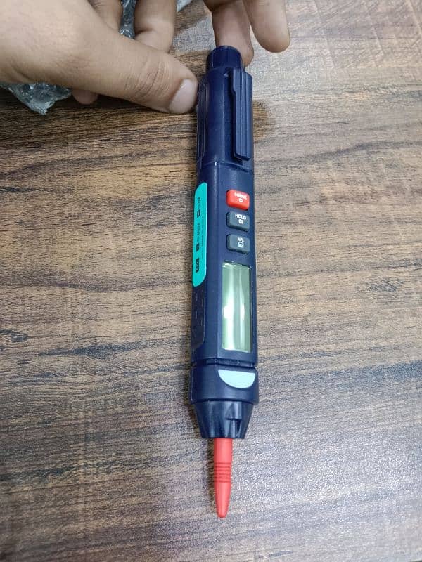 RELIFE DT-02 digital pen multimeter, tool used for testing electronics 2