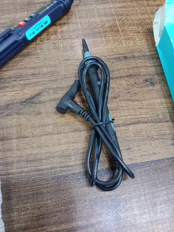 RELIFE DT-02 digital pen multimeter, tool used for testing electronics 3