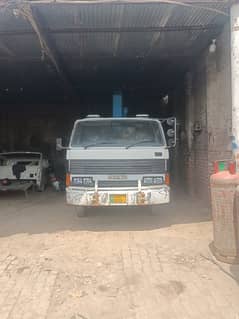 Mazda Foji Faram With Crane