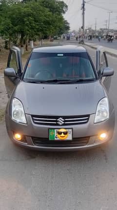Suzuki Swift Dlx 2012 Total Genuine.