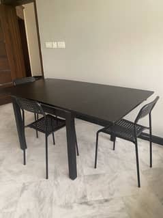 Ikea extendable dining table with 4 chairs