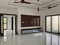 DHAs Crown Jewel 1-Kanal Luxury Designer Bungalow with 5 Master Bedrooms, Lush Lawn & Prime Location, Now Priced Below Expectation!