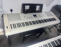 Yamaha dgx650 with stand 3pedal unit sustain and bench