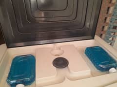 Brand new Air Coole with 4 gel bottle