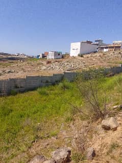 10 Marla Plot Available For Sale On Main Road