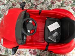 Battery powered automatic car for kids