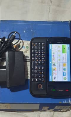 Nokia C6 old keypad slide phone