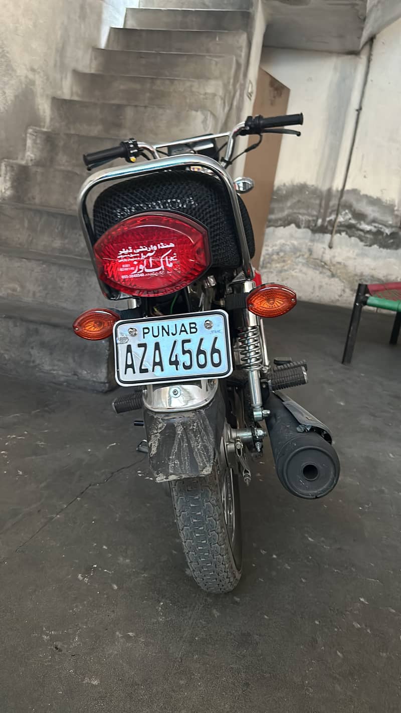 red 125 new model just 2999 driven with complete docs 14