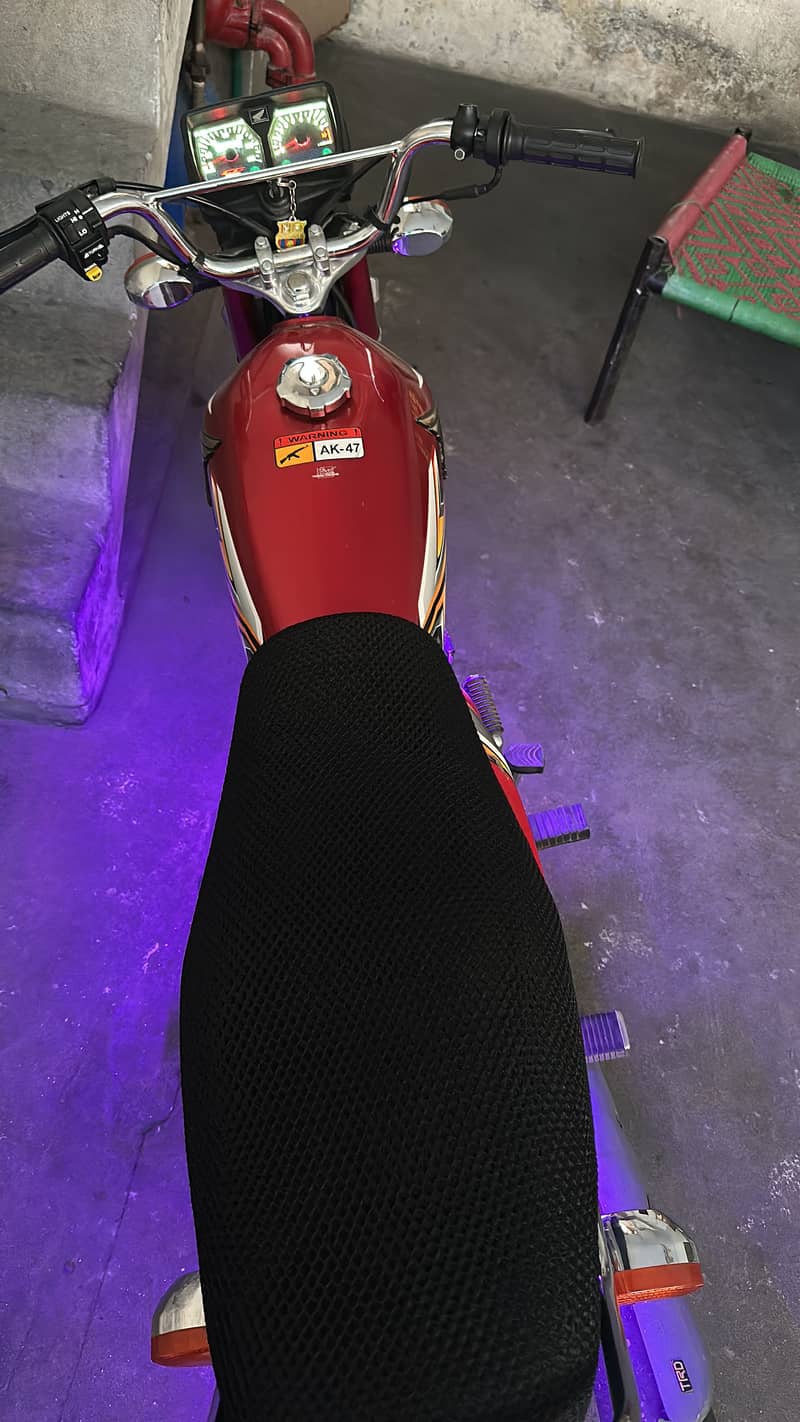 red 125 new model just 2999 driven with complete docs 16