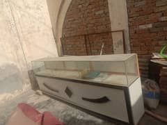 wooden counter with glass work
