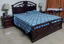 Pure wooden bed with side tables and dressing
