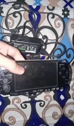 Psp 2000 with 32gb memory card and genuine charger