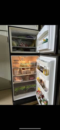 Dawlance full size black fridge fully jn working condition