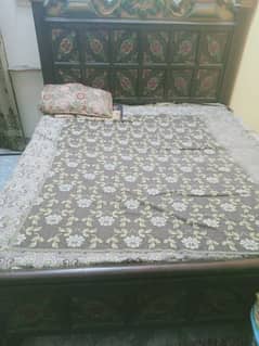 King size bed with side table and dressing table