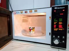 Dawlance microwave oven 2 in 1 grill cooking bhi hote h