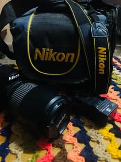 dslr Nikon d3200 with 70/300 lens best for zoom