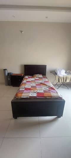 2 single beds without mattresses
