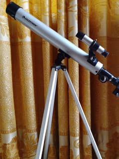 Celestron Power seeker 50 Telescope, with tripod and 4mm lens and 20mm