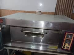 Urgent selling large piza oven with stand and smal piza oven with some