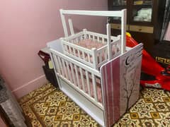 Baby cot with swing