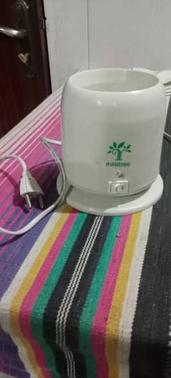 feeder warmer