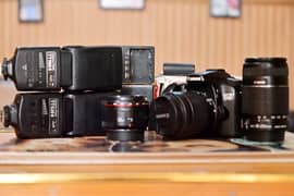 Canon eos 70D with 18-55mm.  55-250mm.  50mm 1.8.    2 flash or triger