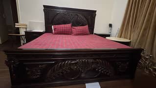 King size bed with side tables and dressing table