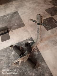 machine along with bench and rods