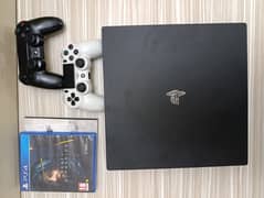 PS4 Pro with 2 games & controllers