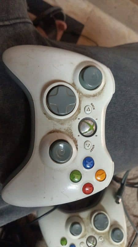 Xbox 360 with j-tag which helps to download game with copy and paste 3
