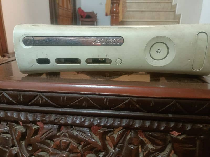 Xbox 360 with j-tag which helps to download game with copy and paste 7