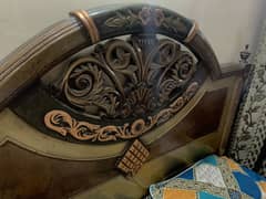 Wooden bed with dressing and side tables