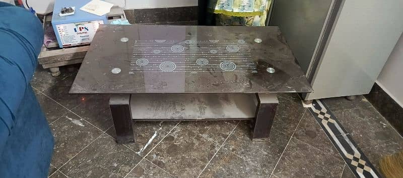 the upper part of table is made by glass and lower part is made bywood 0