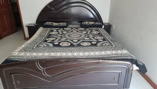 bed and dressing tables